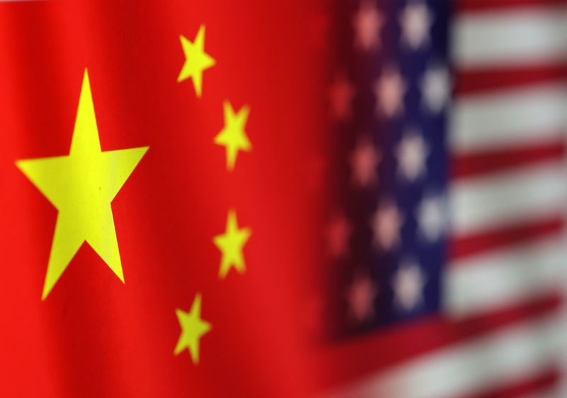 FILE PHOTO: U.S. and Chinese flags are seen in this illustration taken, January 30, 2023. REUTERS/Dado Ruvic/Illustration/File photo