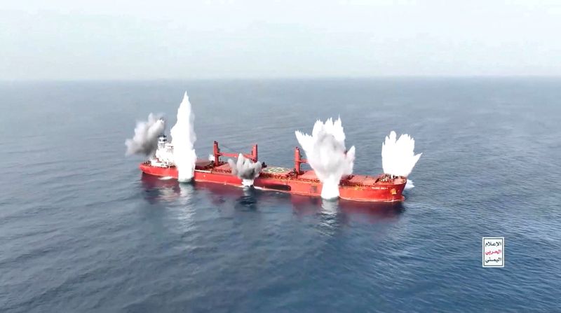 Plumes of smoke rise from what is said to be Liberia-flagged, Greek-operated bulk carrier, the MV Magic Seas that was, according to Yemen's Houthis, attacked following an alleged exchange with the captain, off southwest Yemen, in this screen grab taken from a handout video released on July 8, 2025. HOUTHI MEDIA CENTER/Handout via REUTERS    THIS IMAGE HAS BEEN SUPPLIED BY A THIRD PARTY. TEXT OVERLAY FROM SOURCE.