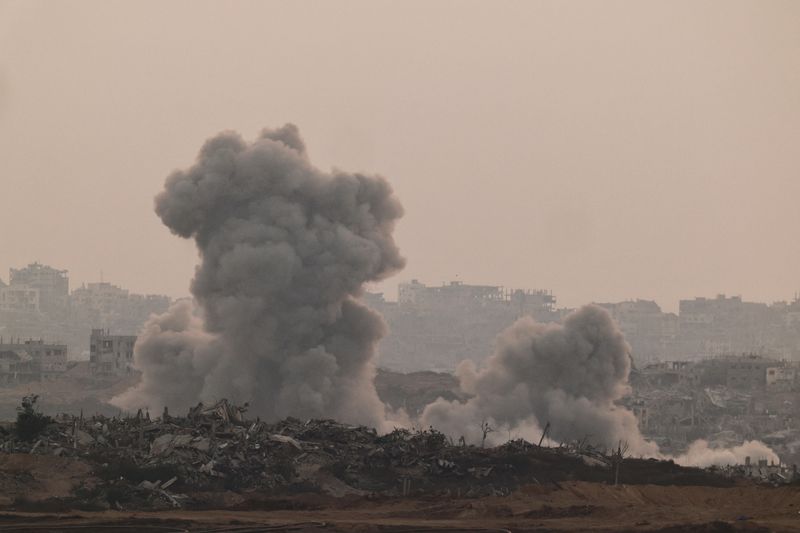 FILE PHOTO: Smoke rises from Gaza after an explosion, as seen from the Israeli side of the Israel-Gaza border, July 10, 2025. REUTERS/Amir Cohen/File Photo