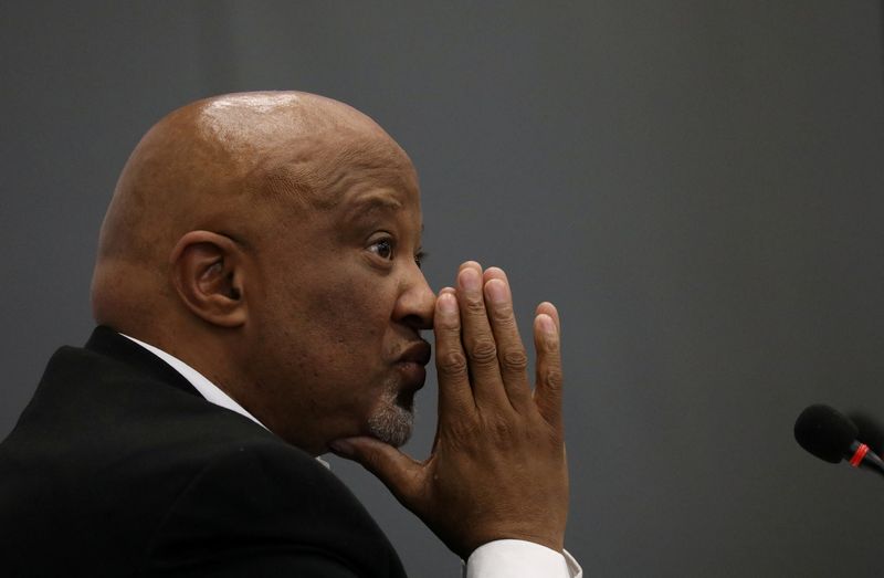 FILE PHOTO: Former Deputy Finance Minister Mcebisi Jonas gestures ahead of the Judicial Commission of Inquiry probing state capture in Johannesburg, South Africa August 24, 2018. REUTERS/Siphiwe Sibeko/File Photo