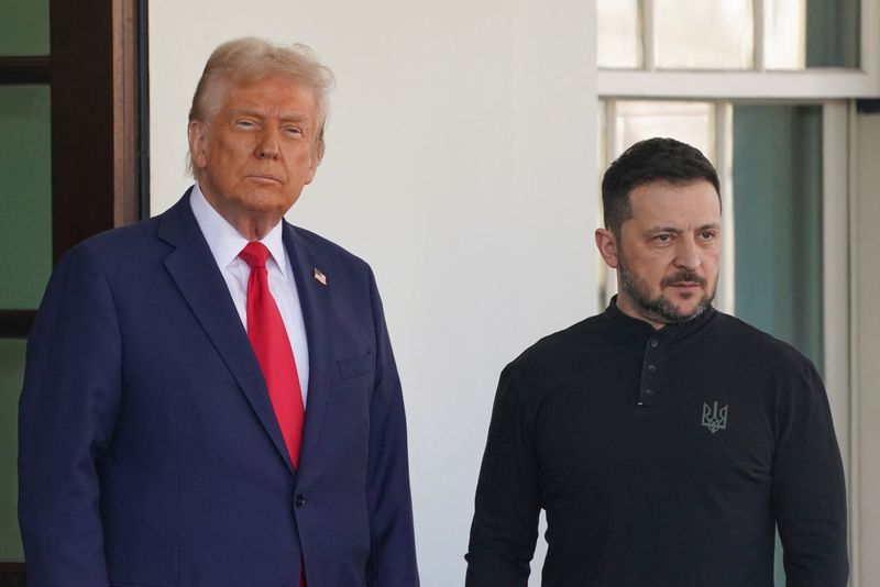 FILE PHOTO: U.S. President Donald Trump and Ukrainian President Volodymyr Zelenskiy look on on the day of a meeting at the White House in Washington, D.C., U.S., February 28, 2025. REUTERS/Nathan Howard/File Photo