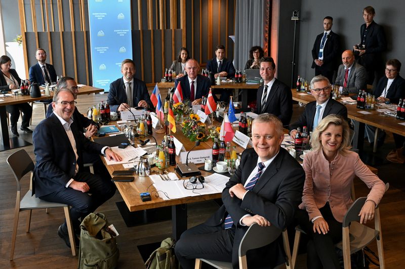 European Commissioner for Internal Affairs and Migration Magnus Brunner, Danish Minister of Immigration and Integration Kaare Dybvad Bek, French Interior Minister Bruno Retailleau, German Interior Minister Alexander Dobrindt, Parliamentary State Secretary to the Federal Minister of the Interior Daniela Ludwig, Polish Interior Minister Tomasz Siemoniak, Austrian Interior Minister Gerhard Karner, and Czech Interior Minister Vit Rakusan meet to discuss migration policies, during Zugspitze Summit, near Garmisch-Partenkirchen, Germany, July 18, 2025.  REUTERS/Angelika Warmuth