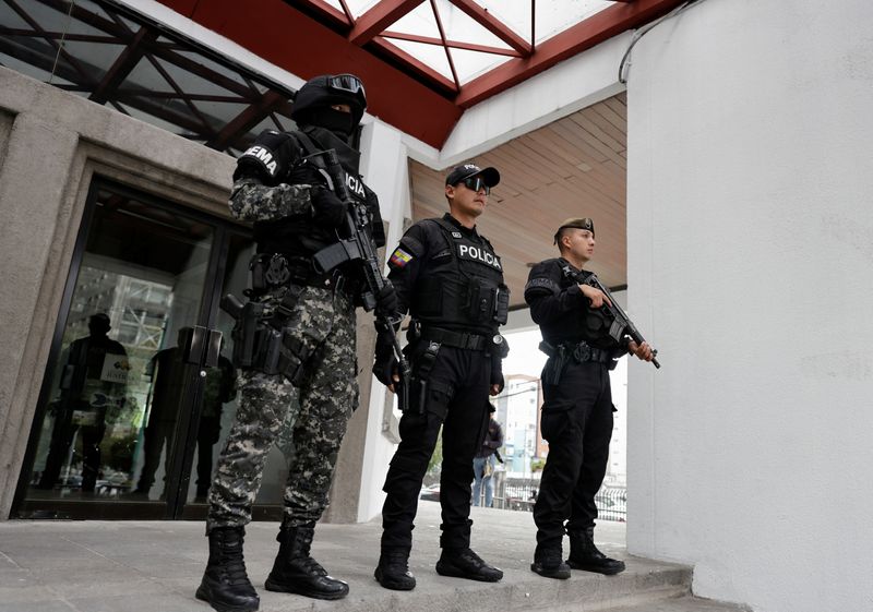 FILE PHOTO: Security forces stand outside the National Court of Justice following a hearing for the extradition of Ecuadorean gang leader Jose Adolfo Macias, known as "Fito," who on Friday accepted the court's request to be extradited to the United States to face drug and gun charges, in Quito, Ecuador, July 11, 2025. REUTERS/Karen Toro/File Photo