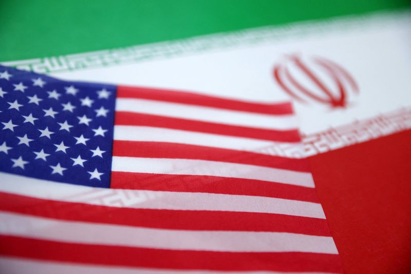 FILE PHOTO: U.S. and Iran flags are seen in this illustration taken June 18, 2025. REUTERS/Dado Ruvic/Illustration/File Photo