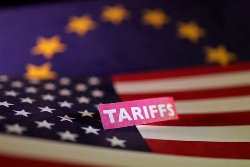 FILE PHOTO: U.S. and European Union flags and a "tariffs" label are seen in this illustration taken April 10, 2025. REUTERS/Dado Ruvic/Illustration/File Photo