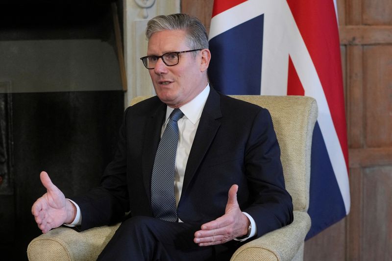Britain's Prime Minister Keir Starmer speaks to Prime Minister Narendra Modi of India (not pictured) as they meet for bilateral talks at Chequers near Aylesbury, England, Thursday, July 24, 2025.    Kin Cheung/Pool via REUTERS/File Photo