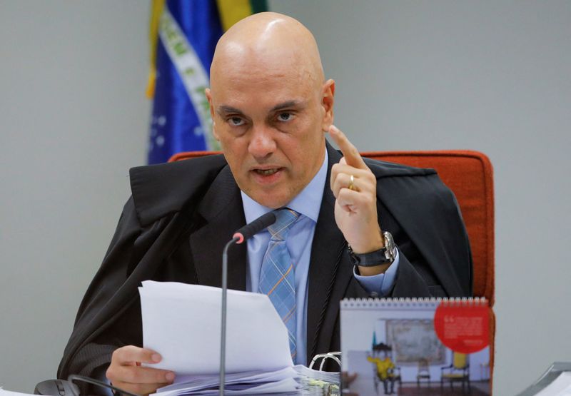 Brazil's Supreme Court Minister Alexandre de Moraes talks during Brazil's Supreme Court trial over an alleged coup attempt, in Brasilia, Brazil June 9, 2025. REUTERS/Diego Herculano/File Photo