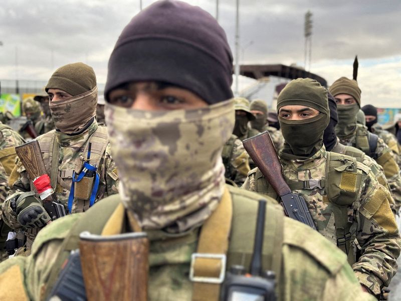 FILE PHOTO: Khaled Brigade, a part of Hay'at Tahrir al-Sham (HTS), hold a military parade, after Syria's Bashar al-Assad was ousted, in Damascus, Syria, December 27, 2024. REUTERS/Ahmed Jadallah/File Photo