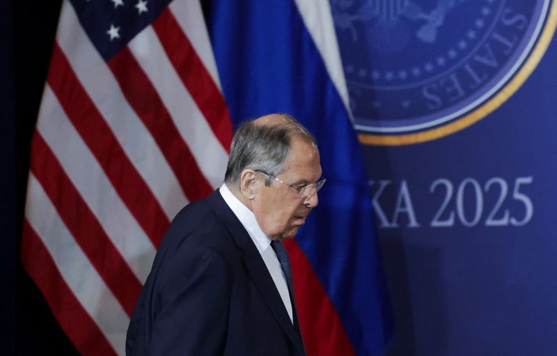 FILE PHOTO: Russian Foreign Minister Sergei Lavrov walks ahead of a joint press conference by U.S. President Donald Trump and Russian President Vladimir Putin, following their meeting to negotiate an end to the war in Ukraine, at Joint Base Elmendorf-Richardson in Anchorage, Alaska, U.S., August 15, 2025. REUTERS/Jeenah Moon/File photo