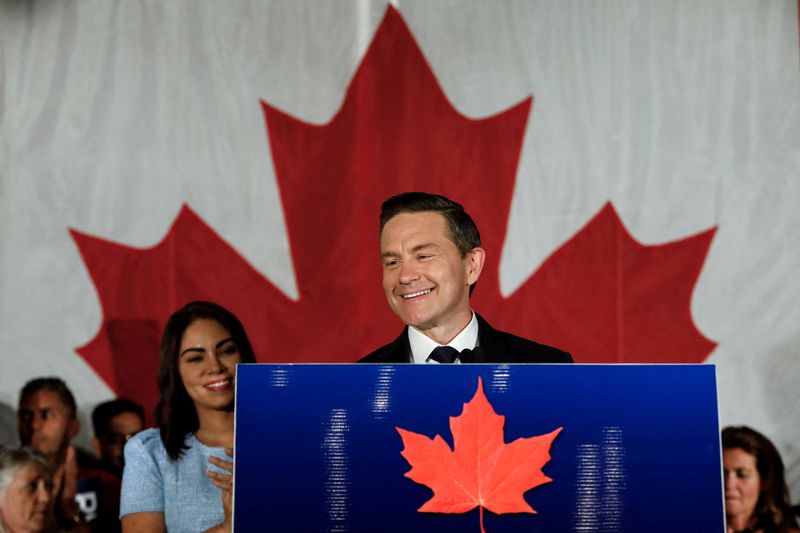 Canada's federal Conservative leader Pierre Poilievre takes the podium after winning a by-election in Alberta's Battle River-Crowfoot riding, after he lost his long-held Ottawa constituency in the general election, in Camrose, Alberta, Canada, August 18, 2025.  REUTERS/Amber Bracken