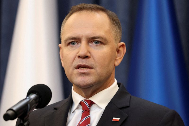 FILE PHOTO: Polish President Karol Nawrocki gives a statement to the media at the presidential palace in Warsaw, Poland, August 21, 2025. REUTERS/Kuba Stezycki/File Photo