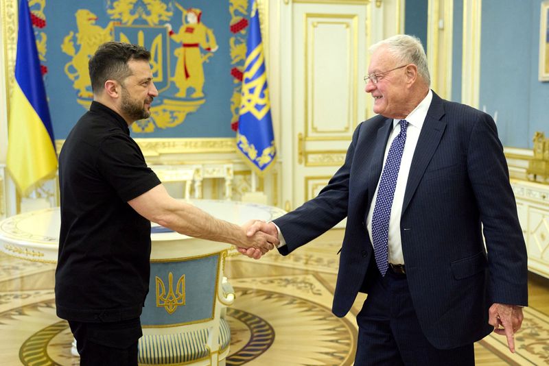 Ukraine's President Volodymyr Zelenskiy shakes hands with U.S. Special Envoy for Ukraine Keith Kellogg, amid Russia's attack on Ukraine, in Kyiv, Ukraine August 25, 2025. Ukrainian Presidential Press Service/Handout via REUTERS