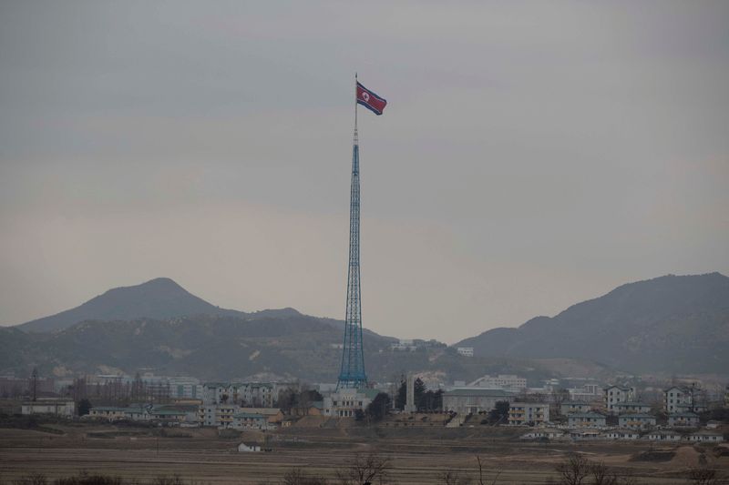 FILE PHOTO: North Korean propaganda village "Gijungdong" is seen from an South Korea's observation post inside the JSA during a media tour at the Joint Security Area (JSA) on the Demilitarized Zone (DMZ) in the border village of Panmunjom in Paju, South Korea, 03 March 2023. JEON HEON-KYUN/Pool via REUTERS/File Photo