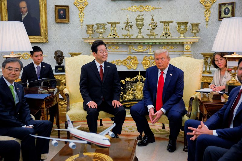 FILE PHOTO: U.S. President Donald Trump meets with South Korean President Lee Jae Myung at the Oval Office, at the White House, in Washington, D.C., U.S., August 25, 2025. REUTERS/Brian Snyder/File Photo