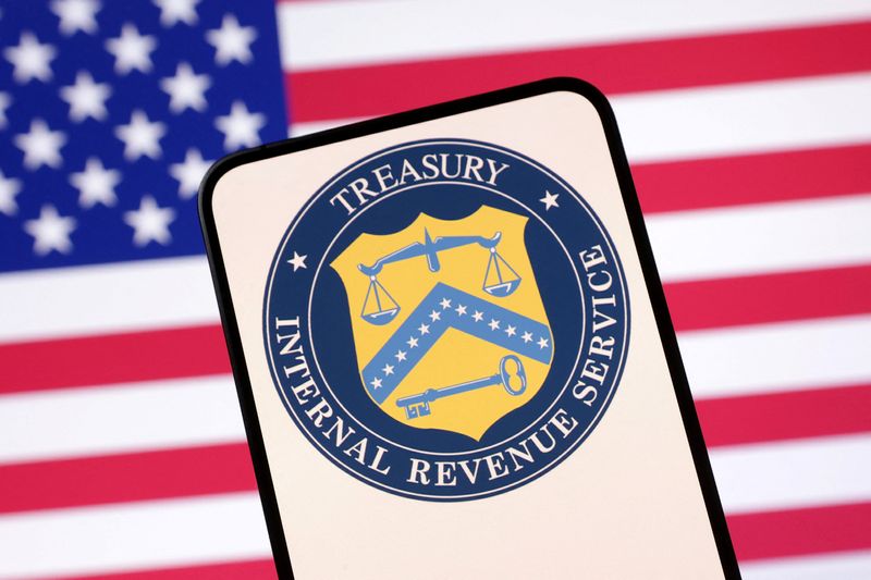 FILE PHOTO: United States Department of the Treasury logo and U.S. flag are seen in this illustration taken April 23, 2025. REUTERS/Dado Ruvic/Illustration/File Photo