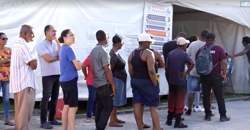 People wait to cast their vote during the general election in Georgetown, Guyana, September 1, 2025, in this screen grab taken from a video. Reuters TV/via REUTERS