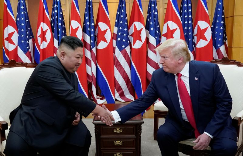 U.S. President Donald Trump shakes hands with North Korean leader Kim Jong Un as they meet at the demilitarized zone separating the two Koreas, in Panmunjom, South Korea, June 30, 2019. REUTERS/Kevin Lamarque