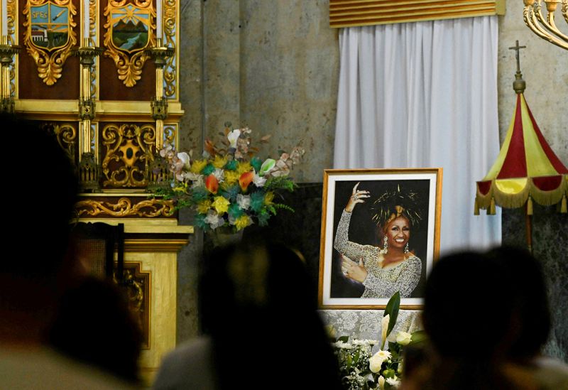 Cubans attend a commemorative Mass for the centenary of Cuban salsa singer Celia Cruz at the Our Lady of Charity Church in Havana, Cuba October 21, 2025. REUTERS/Norlys Perez