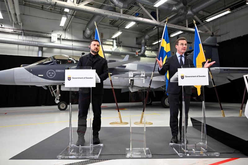 Sweden's Prime Minister Ulf Kristersson and Ukrainian President Volodymyr Zelenskiy hold a joint press conference following their meeting and visit to Saab in Linkoping, Sweden, October 22, 2025. Fredrik Sandberg/TT News Agency/via REUTERS