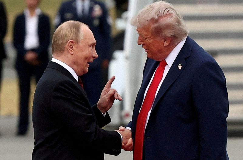 U.S. President Donald Trump shakes hand with Russian President Vladimir Putin at Joint Base Elmendorf-Richardson in Anchorage, Alaska, U.S., August 15, 2025. REUTERS/Kevin Lamarque