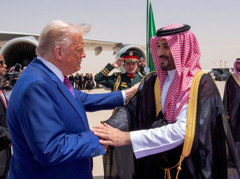 FILE PHOTO: U.S. President Donald Trump shakes hands with Saudi Crown Prince Mohammed Bin Salman during a welcoming ceremony in Riyadh, Saudi Arabia, May 13, 2025. Bandar Algaloud/Courtesy of Saudi Royal Court/Handout via REUTERS/File Photo
