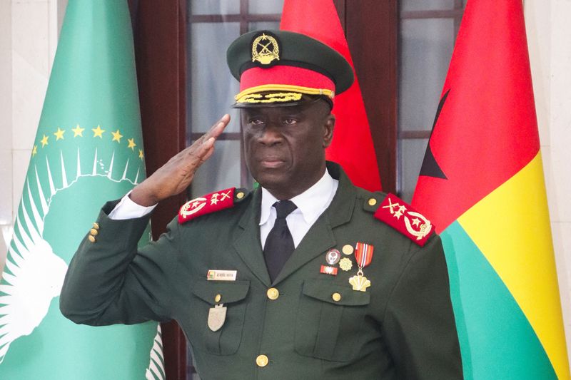 Major-General Horta Inta-a, the new transitional president, salutes during the swearing-in ceremony of Major-General Tomas Djassi as the new chief of staff of the Armed Forces in Bissau, Guinea-Bissau November 27, 2025. REUTERS/Delcyo Sanca