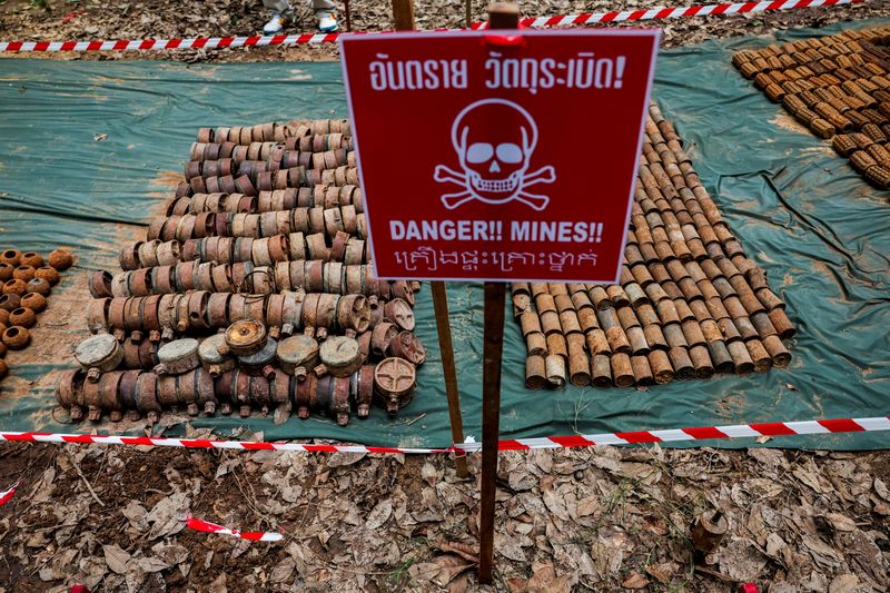 Old landmines that Thailand says were detonated and recovered near the disputed border between Thailand and Cambodia are displayed during a media visit organized by the Royal Thai Army, following a ceasefire between Cambodia and Thailand, in Surin province, Thailand, August 20, 2025. REUTERS/Chalinee Thirasupa