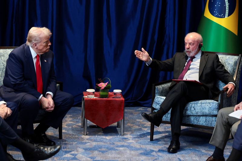 U.S. President Donald Trump and Brazilian President Luiz Inacio Lula da Silva meet on the sidelines of the 47th Association of Southeast Asian Nations (ASEAN) summit in Kuala Lumpur, Malaysia, October 26, 2025. REUTERS/Evelyn Hockstein