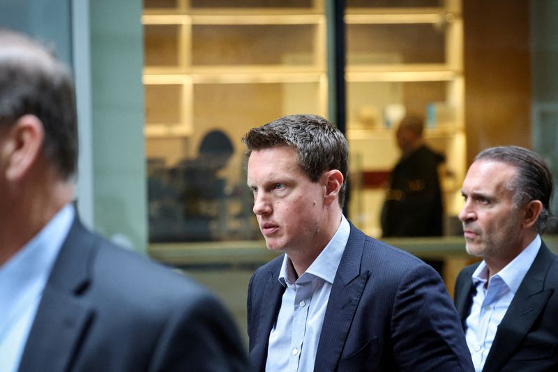 David Ellison, CEO of Paramount Skydance, exits following an interview at the New York Stock Exchange in New York City, U.S., December 8, 2025.  REUTERS/Brendan McDermid