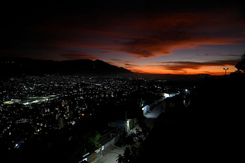 The sun rises after U.S. President Donald Trump said on Saturday the U.S. has struck Venezuela and captured its President Nicolas Maduro, in Caracas, Venezuela January 3, 2026. REUTERS/Maxwell Briceno