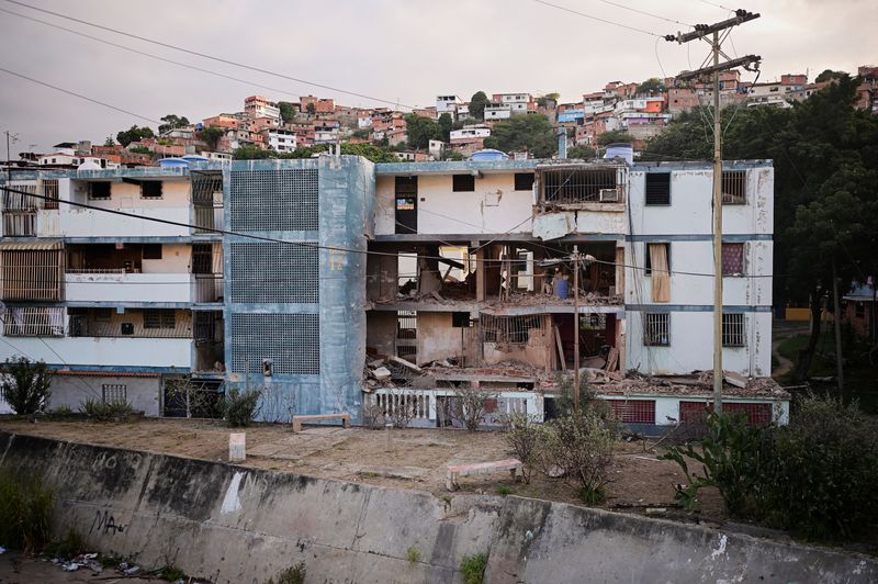A damaged building following U.S. strikes on Venezuela, during which President Nicolas Maduro and his wife, Cilia Flores, were captured, in Catia La Mar, Venezuela, January 4, 2026. REUTERS/Gaby Oraa
