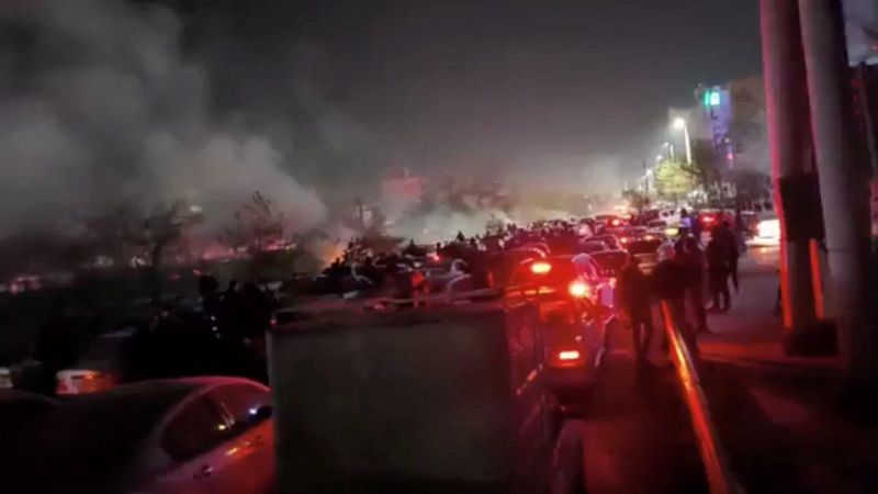 Smoke rises as protesters gather amid evolving anti-government unrest in Mashhad, Razavi Khorasan province, Iran, released on January 10, 2026, in this screen grab obtained from a social media video. SOCIAL MEDIA/via REUTERS