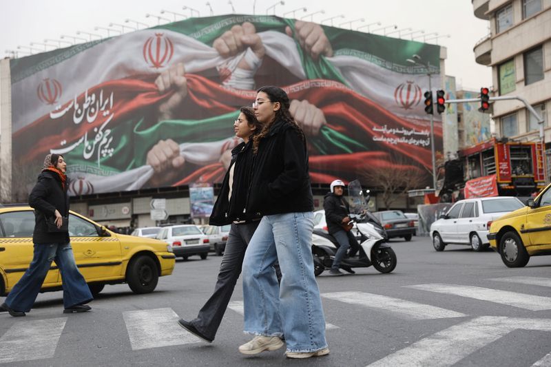 Iranian women walk on a street in Tehran, Iran, January 19, 2026. Majid Asgaripour/WANA (West Asia News Agency) via REUTERS