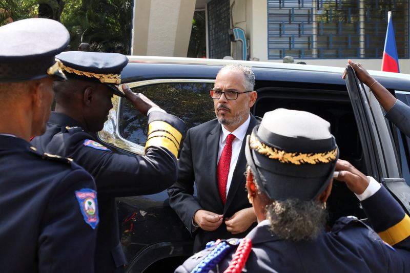Haiti's Prime Minister Alix Didier Fils‑Aime arrives at a police graduation ceremony as Transitional Presidential Council members Leslie Voltaire and Edgard Leblanc Fils seek to proceed with a plan to remove Fils‑Aime within 30 days following established procedures, despite U.S. warnings that such a move would have consequences, in Port‑au‑Prince, Haiti, January 23, 2026. REUTERS/Fildor Pq Egeder