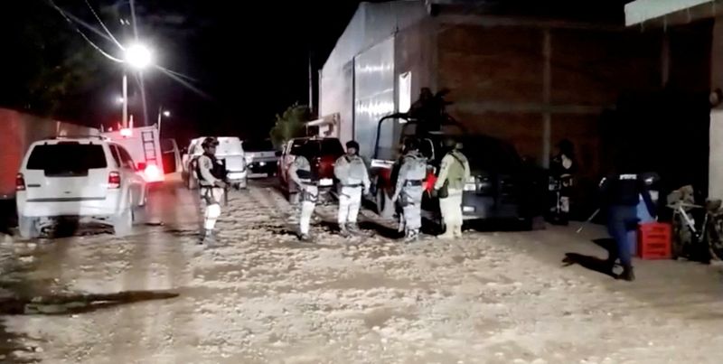 Security personnel work at the site where a group of armed attackers killed several people at a soccer sports field after a match in Salamanca, Mexico, January 25, 2026, in this screen grab taken from a video. REUTERS TV via REUTERS