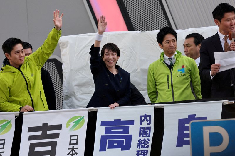 FILE PHOTO: Sanae Takaichi, Japan's Prime Minister and leader of the ruling Liberal Democratic Party (LDP), Japan Innovation Party co-leader Fumitake Fujita and Hirofumi Yoshimura, Japan Innovation Party leader, attend an election campaign event on the first day of campaigning for the February 8 snap election, in Tokyo, Japan, January 27, 2026. REUTERS/Kim Kyung-Hoon/File Photo