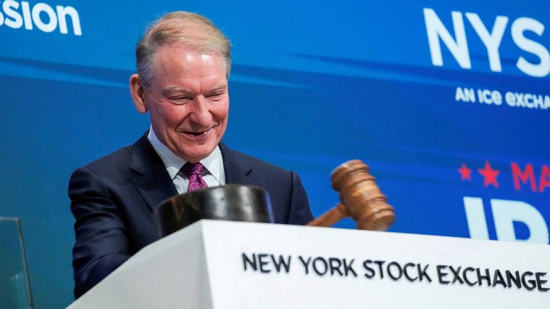 U.S. Securities and Exchange Commission (SEC) Chair Paul Atkins smiles after ringing the opening bell at the New York Stock Exchange (NYSE) in New York City, U.S., December 2, 2025. REUTERS/Eduardo Munoz
