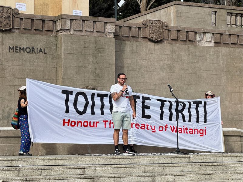 Anaru Ryall speaks at a protest demanding New Zealand's government to honour the Treaty of Waitangi in Wellington, New Zealand, February 6, 2025. REUTERS/Lucy Craymer