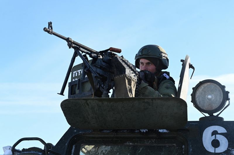 A Russian service member of a separate engineering unit of the Southern Military District aims a weapon while undergoing an intensive combat training in the Rostov region, Russia, January 19, 2026. REUTERS/Sergey Pivovarov