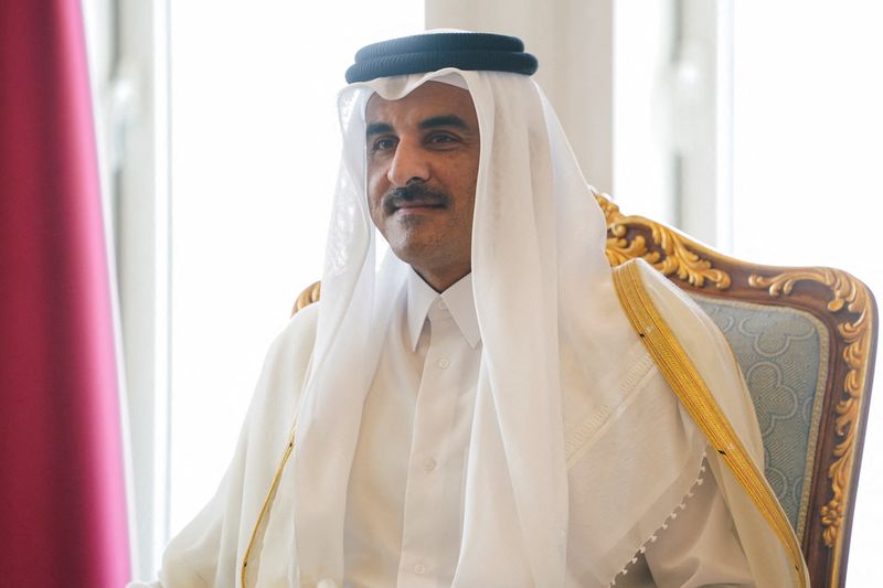 FILE PHOTO: Qatar's Emir Sheikh Tamim bin Hamad Al Thani meets U.S. Secretary of State Marco Rubio (not pictured) at Amiri Diwan, in Doha, Qatar September 16, 2025. REUTERS/Nathan Howard/Pool/File Photo