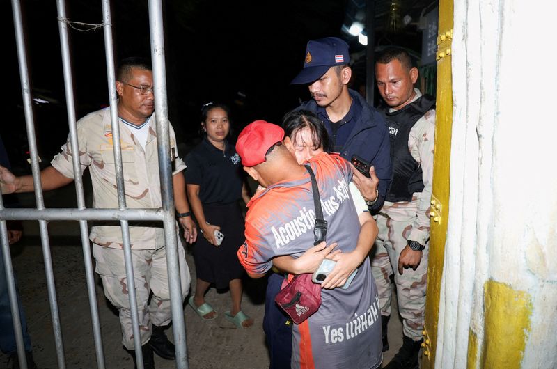 A girl reacts as she reunites with her family after being evacuated from Patongprathankiriwat School, where she had been hiding during an incident in which a gunman entered the school and held an unknown number of students and teachers hostage, in southern Thailand’s Songkhla, Thailand, February 11, 2026. REUTERS/Roylee Suriyaworakul