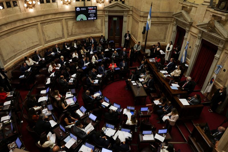 Members of Argentina's Senate attend a session to discuss labor reforms proposed by President Javier Milei's libertarian government to attract investment and revive growth, as unions say it would roll back workers' rights, in Buenos Aires, Argentina February 12, 2026. REUTERS/Cristina Sille