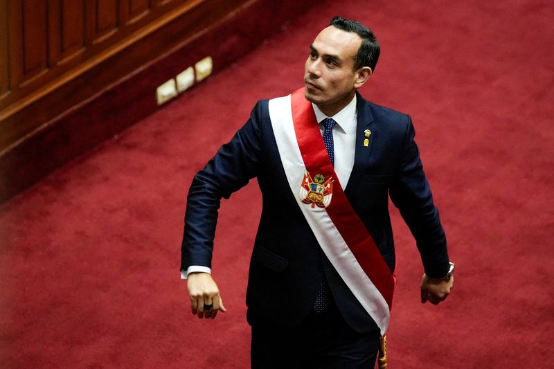 FILE PHOTO: Peru's new president Jose Jeri walks on the day of the swearing-in ceremony, after Congress voted to remove former President Dina Boluarte, in Lima, October 10, 2025. REUTERS/Angela Ponce/File Photo