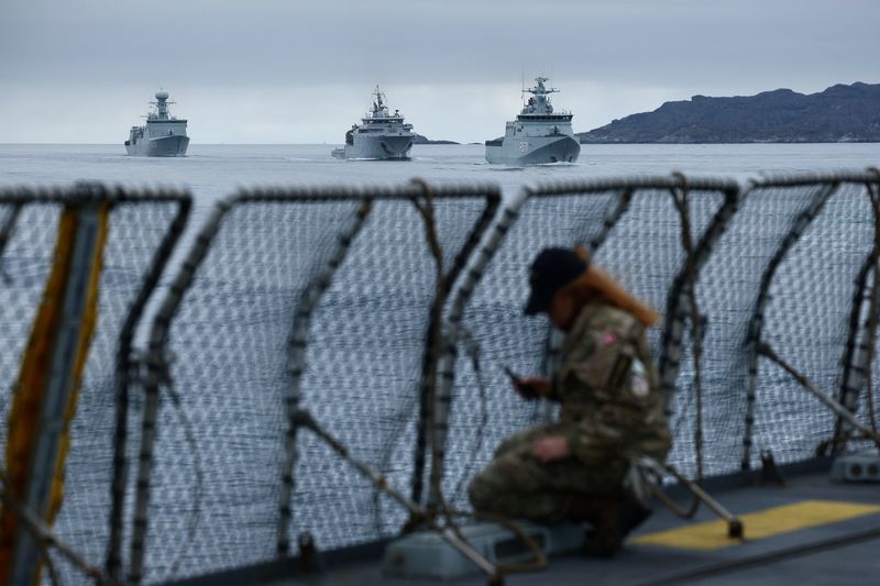 FILE PHOTO: Danish Navy vessels sail near the frigate Niels Juel as Danish and French armed forces perform military drills off the coast of Nuuk, Greenland, September 15, 2025. REUTERS/Guglielmo Mangiapane/File Photo