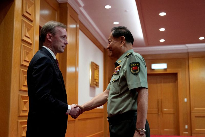 FILE PHOTO: Zhang Youxia, vice chairman of China's Central Military Commission, shakes hands with White House national security adviser Jake Sullivan in Beijing, Thursday, Aug. 29, 2024.   Ng Han Guan/Pool via REUTERS/File Photo/File Photo