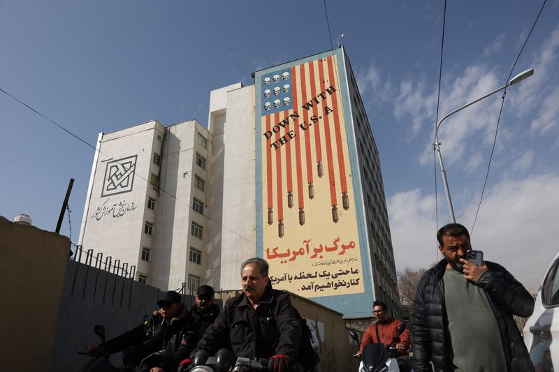 A graffiti on a wall reads" Down with the U.S.A", after Israel said it launched a pre-emptive attack against Iran, in Tehran, Iran, February 28, 2026. Majid Asgaripour/WANA (West Asia News Agency) via REUTERS