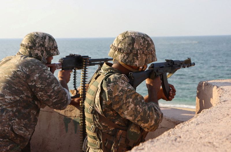 FILE PHOTO: Members of the Islamic Revolution Guards Corps (IRGC) navy participate in an exercise in the south of Iran, in this picture obtained on January 17, 2023. IRGC/WANA (West Asia News Agency)/Handout via REUTERS/File Photo