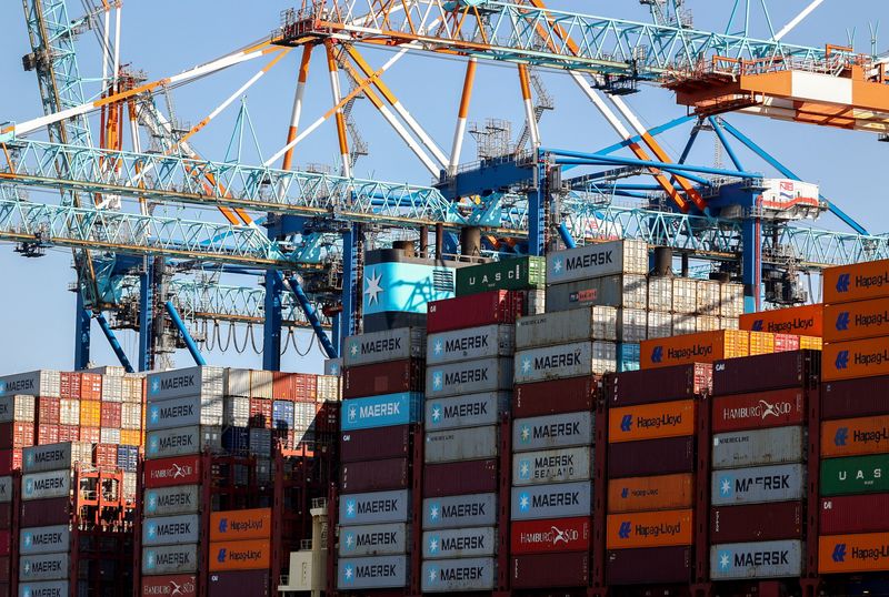 Cranes unload Containers off the Maribo Maersk container ship at a terminal wharf in Bremerhaven, Germany, August 13, 2025. REUTERS/Leon Kuegeler
