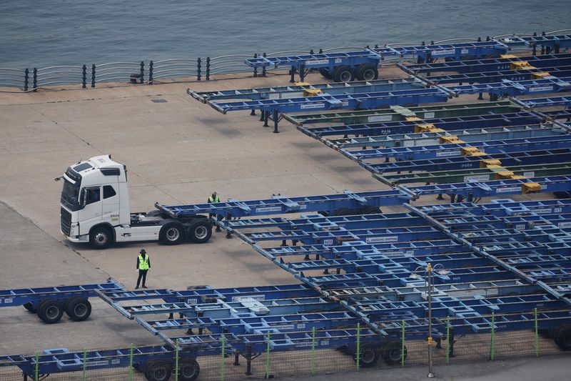 Employees work at Pyeongtaek port in Pyeongtaek, South Korea, July 8, 2025. REUTERS/Kim Hong-Ji