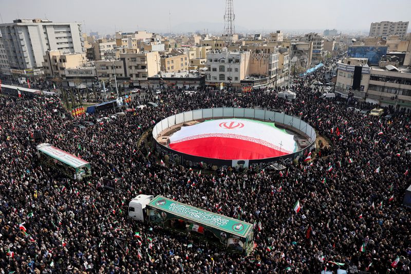 People attend a funeral ceremony for the Iranian military commanders who were killed in strikes, amid the U.S.-Israeli conflict with Iran, in Tehran, Iran, March 11, 2026. Majid Asgaripour/WANA (West Asia News Agency) via REUTERS ATTENTION EDITORS - THIS PICTURE WAS PROVIDED BY A THIRD PARTY